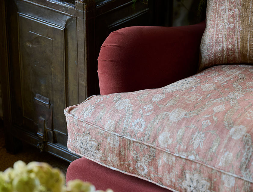 Chiddingfold 3 Seater Sofa in Omega Tawny Velvet and V&A Threads of India Regal Arabesque Flame with scatters in Sulawesi Splendour Jasper